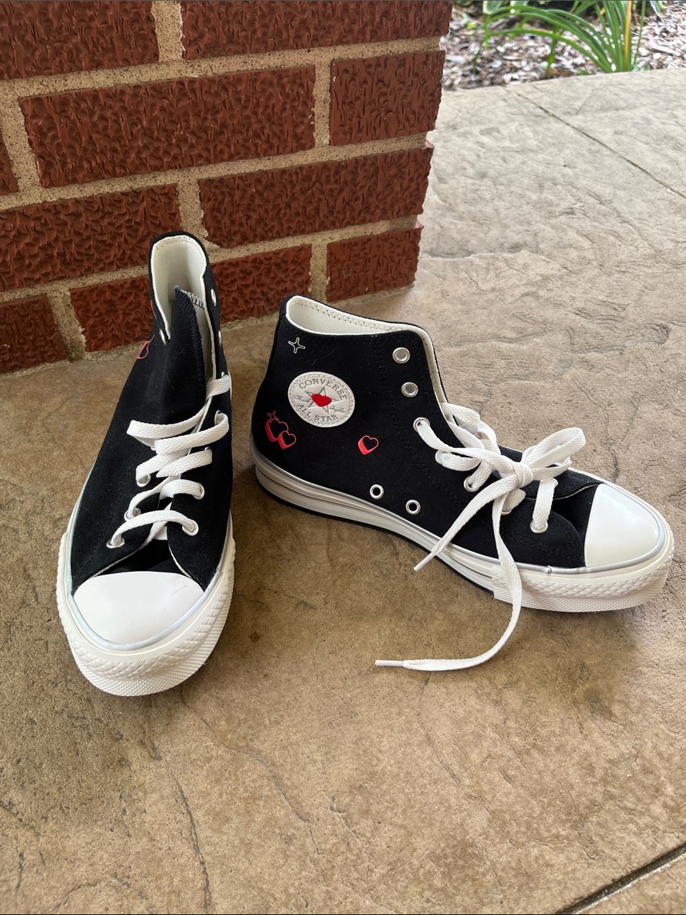 Converse Kids Black High-Top Sneakers with White Soles and Red Heart Details